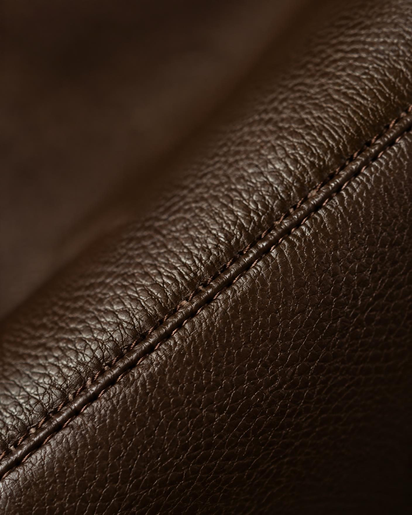 Close view of pebbled leather with saddle stitching